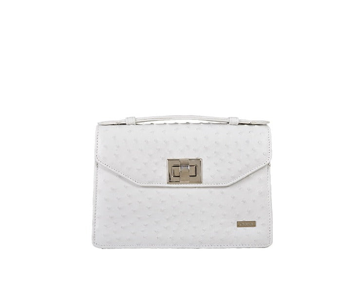 White Ostrich Leather Top flap handbag with nickel turn lock, pop up handle and leather and chain detachable adjustable shoulder strap that can be adjusted to wear cross body, shoulder or as a clutch