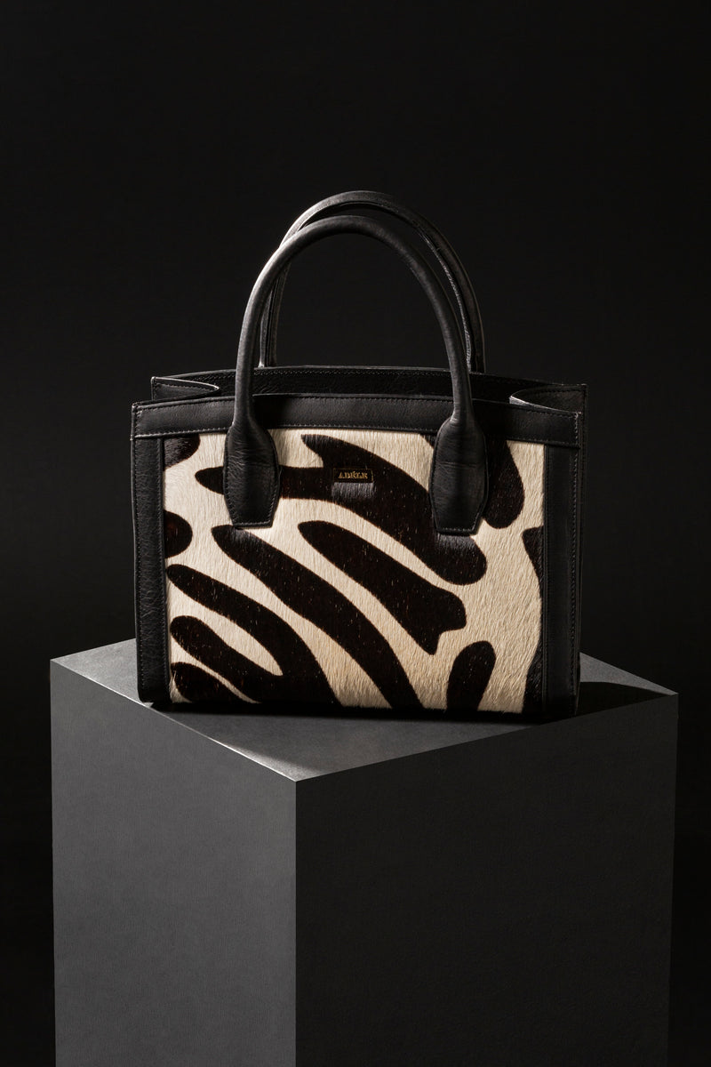 Lauren - Small top handle tote bag, zebra printed hair on hide and black leather