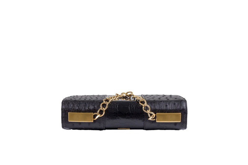 Adele Exclusive Luxury Design Top view Belinda ostrich and ostrich shin top flap clutch bag with top chain handle and 24 carat gold plated decorative hardware . Detachable shoulder strap from chain and leather. Inside back zipper pocket and front inside patch pocket. Suede leather lining and hidden magnetic lock closure. 