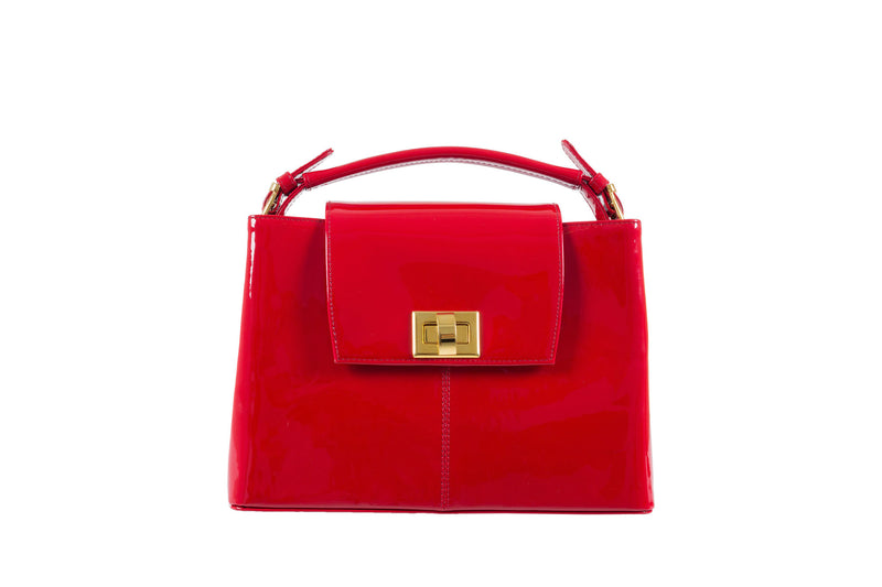 Front view patent leather bag constructed fold over flap with turn lock closure. Adjustable handles decorated with a buckle and gold hardware. Internal zip pocket, two internal patch pockets and a zipper middle pocket. Detachable shoulder strap. High quality red suede leather interior. Bag feet studs.