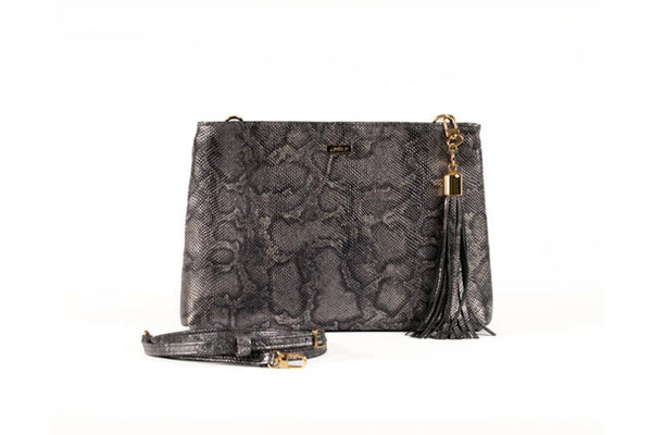 Front view, Adele style Lana, silver snake printed leather clutch/sling bag with adjustable detachable shoulder strap