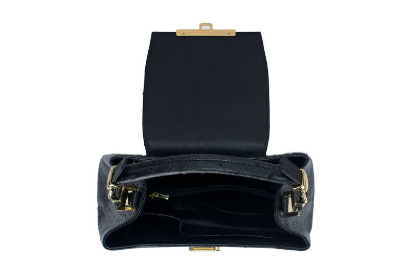 Open top view ostrich leather constructed top flap handbag with an Italian lift lock closure. Inside zipper pocket, leather suede interior. Top handle 24 carat gold plated hardware,detachable shoulder strap with adjustable buckle. Bottom feet studs.