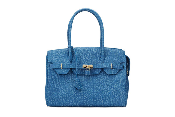 Front view Ripple buffalo blue leather handbag with top zip. The interior contains an inside zip pocket with two internal patch pockets, and is lined with high quality black suede leather. Features a double handle and a gold lock system as decorative hardware. Bag feet studs are located on the bottom panel of the bag.