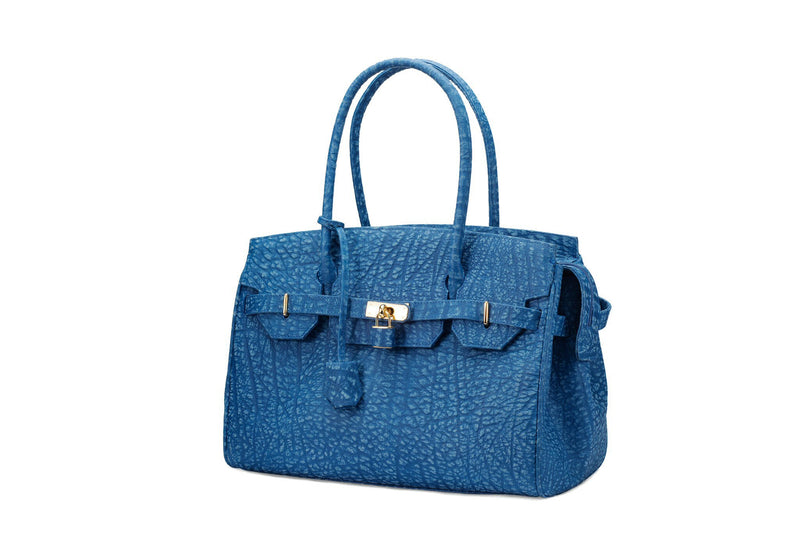 Front side view Ripple buffalo blue leather handbag with top zip. The interior contains an inside zip pocket with two internal patch pockets, and is lined with high quality black suede leather. Features a double handle and a gold lock system as decorative hardware. Bag feet studs are located on the bottom panel of the bag.