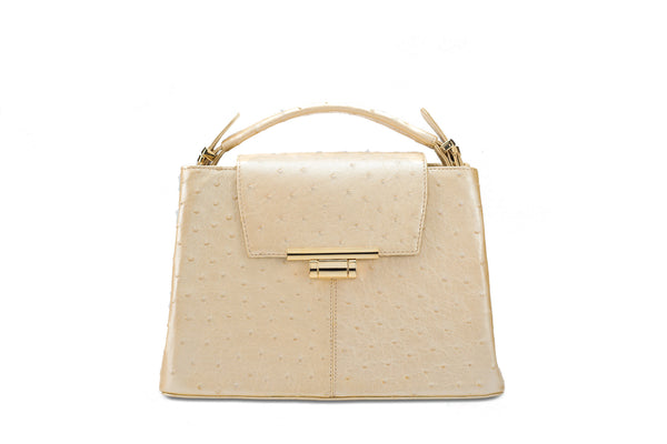 Ostrich leather constructed top flap handbag with an Italian lift lock closure. Inside zipper pocket, leather suede interior. Top handle 24 carat gold plated hardware,detachable shoulder strap with adjustable buckle. Bottom feet studs.